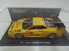 Flyslot - Ferrari F40 Nurburgring Edition # F03302 in a perspex display case.