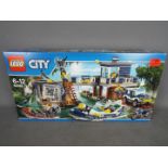 LEGO - A boxed Lego City set #60069 'Swamp Police Station'.