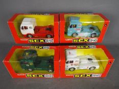 Matchbox SCX - 4 x Mercedes Benz racing truck models in various liveries including Esso and BP.