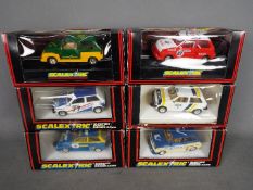 Scalextric - 6 x Metro models from the 1980s in various liveries including Esso and Computervision.