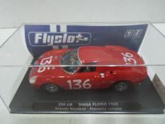 Flyslot - Ferrari 250 LM 1965 Targa Florio car in a perspex display case.