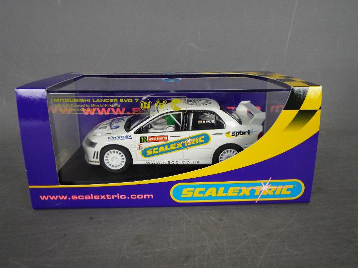 Scalextric - NSCC Mitsubishi Lancer Evo 7 Gwyndaf Evans rally car.