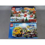 LEGO - 2 X Lego city sets factory sealed; 60133 Advent Calendar and 60060 Auto Transporter.