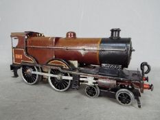 Hornby - An unboxed Hornby No.2 Special Clockwork 4-4-0 Locomotive Op.No.1185 in LMS brown livery.