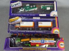 Siku - Three boxed Siku diecast commercial vehicles.