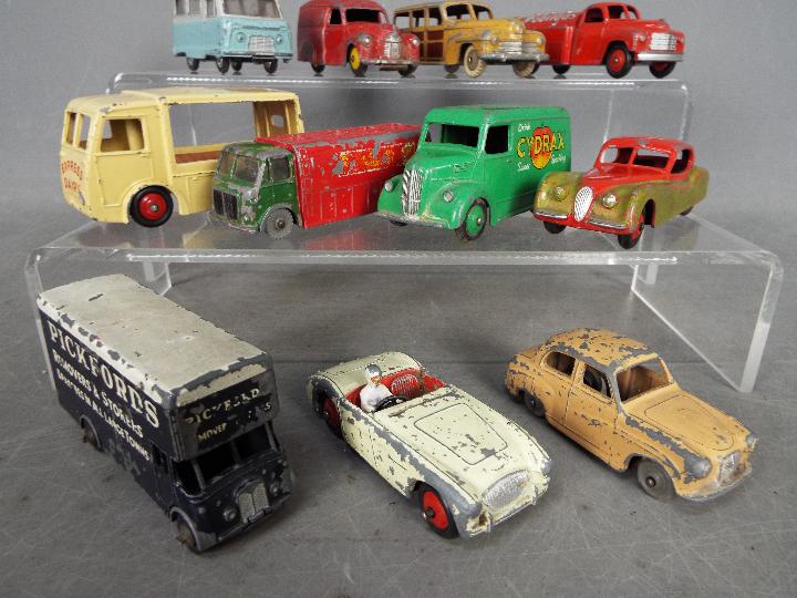 Dinky Toys, Corgi Toys, Kemlow - An unboxed grouping of 11 diecast vehicles. - Image 2 of 3