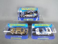 Scalextric - 3 x Ford slot cars, Escort RS1600 in Uniflo livery # C2920,