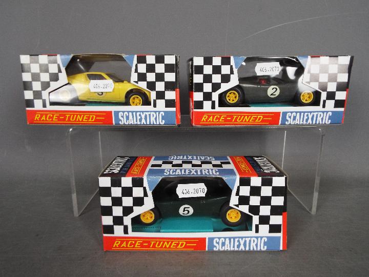 Scalextric - Vintage Lamborghini Miura and 2 x Mirage Ford slot cars in reproduction boxes.