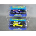 Scalextric - 2 x Caterham 7 limited edition slot cars,