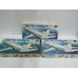 Revell - Three boxed Revell H-119 1:144 scale DC10 Airbus plastic model kits.