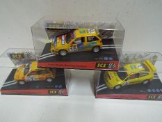 SCX - 3 x SEAT rally slot cars in perspex display cases, # 60520 Cordoba # 60530 Ibiza,