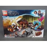 LEGO - A boxed Lego set #79952 'Fantastic Beasts Newt's Case of Magical Creatures'.