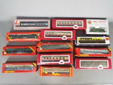 Dapol, Hornby, Lima, Bachmann - A rake of boxed OO gauge passenger coaches.