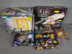 Star Trek, Playmates, Bandai - Three boxed Star Trek related toys.