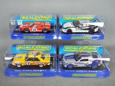 Scalextric - 4 x cars including Ford GT40, Holden Torana, Maserati Trofeo, Chevrolet Camaro.