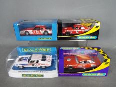 Scalextric - 3 x Chevrolet Camaro race cars and a Monte Carlo.