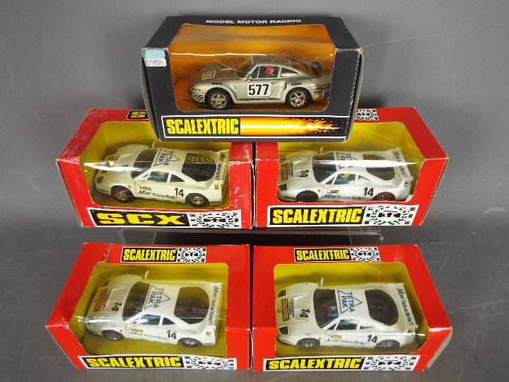 Scalextric - SCX - 4 x Ferrari F40 models and 1 x Porsche 959.
