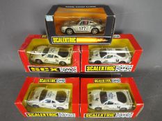 Scalextric - SCX - 4 x Ferrari F40 models and 1 x Porsche 959.