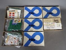 Strombecker - Four boxed 1:32 scale Strombecker slot car trackside building kits.