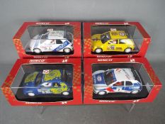 Ninco - 4 x Peugeot 306 Rally cars in including # 50135 in Hella livery, # 50122 in Peugeot livery,