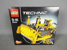 LEGO 42028 - A Lego Technic Bull Dozer 2 in 1 Construction set, factory sealed.