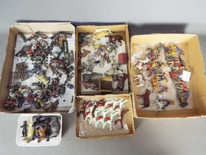 Britains, Unknown Makers - A large unboxed collection of vintage metal civilian figures and animals,