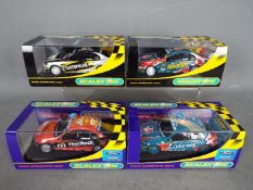 Scalextric - 4 x Ford BA Falcon race cars in various liveries.