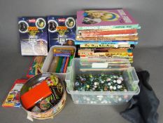 Blue-Box - Tazos - A mixed lot which includes 11 vintage hand held puzzle games,