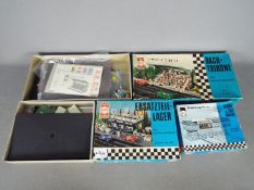 Herpa - Three slot car trackside building kits from Herpa.