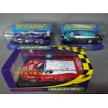 Scalextric - 3 x Maserati MC12 models in various colours and liveries including Vodafone. # C2784.