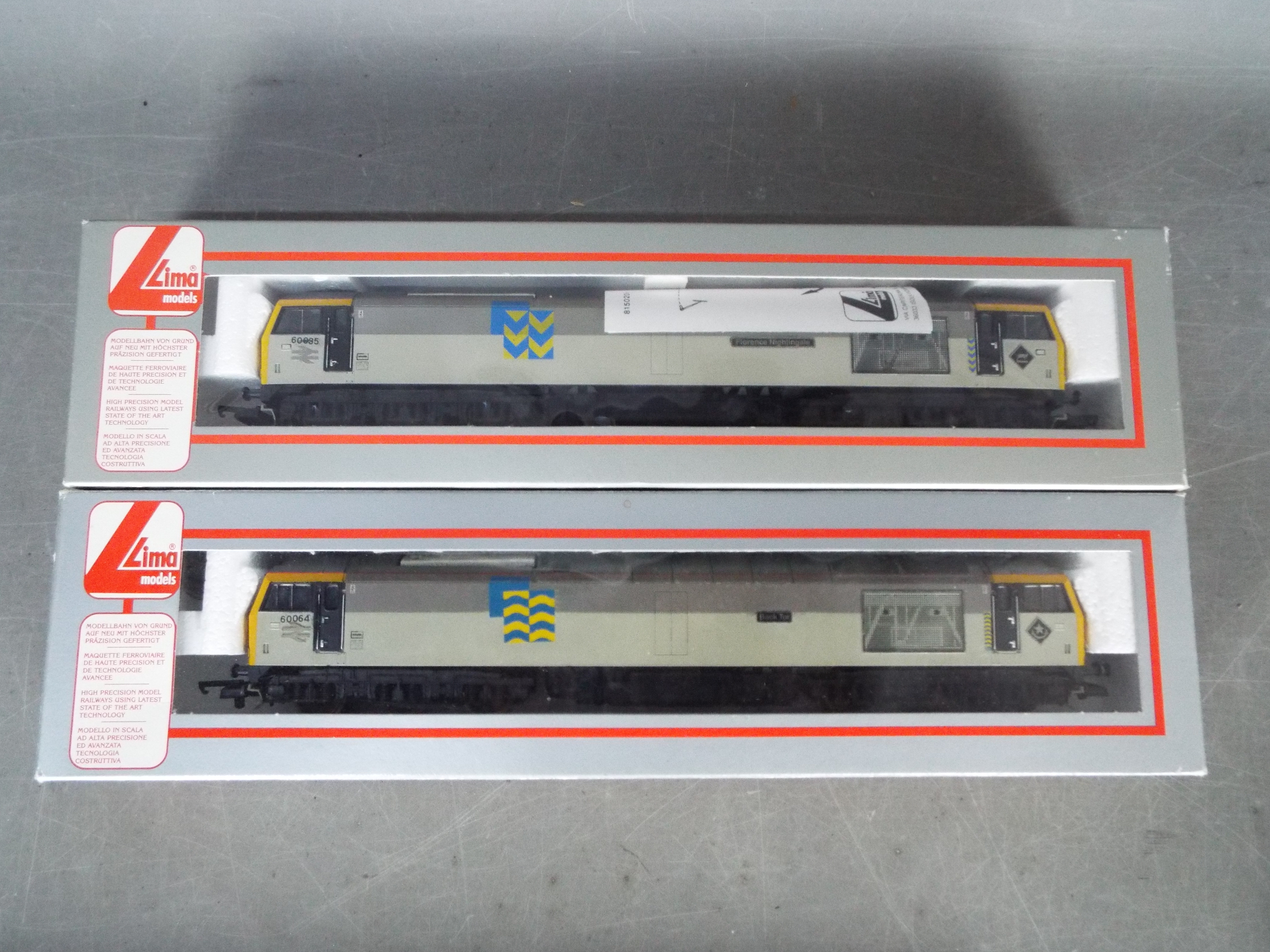 Lima -Two boxed OO gauge diesel electric locomotives by Lima.