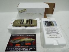 Danbury Mint - 1967 Pontiac GTO Convertible model in 1:24 scale.