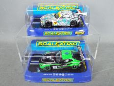 Scalextric - Two boxed Scalextric BMW Z4 GT3 slot cars. Lot contains C3625 Hatsune Miku no.