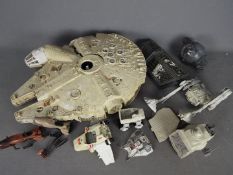 Star Wars - A collection of vintage Star Wars vehicles to include Millennium Falcon, AT-ST,