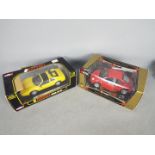Anson - Bburago - 2 x 1:18 scale cars, Ferrari 328 GTS in Giallo Fly, Volkswagen New Beetle in red.