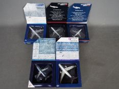 Gemini Jets - A fleet of five boxed diecast 1:400 scale model aircraft in various carrier liveries.