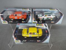 Revell - 3 x NSU TT slot cars in various liveries including # 08314 Leo Rabus car in orange,