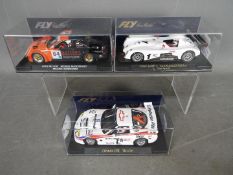 Fly - Three boxed slot cars by Fly.