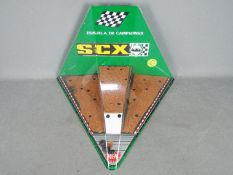 SCX - A vintage SCX perspex Shop Display Cabinet.