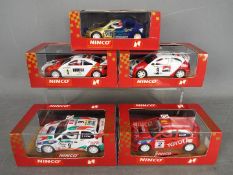 Ninco - 4 x Toyota and 1 x Renault rally cars including # 50161 Megane Catalunya Rally,