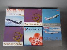 Dragon Wings - A collection of six boxed diecast 1:400 scale model aircraft in various carrier