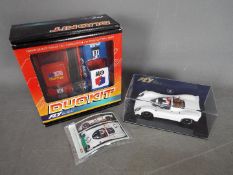 Fly - Two boxed Fly slot cars.