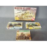 Airfix - Four boxed plastic military vehicle model kits in various scales.