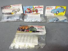 Airfix - Four bagged Airfix plastic model car kits.