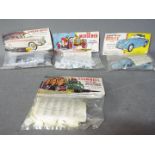 Airfix - Four bagged Airfix plastic model car kits.