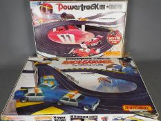Matchbox - 2 x 1970s Powertrack sets # PT1000, Grand Prix, # PT6000, Race & Chase.