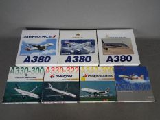 Dragon Wings - A fleet of seven boxed diecast 1:400 scale model aircraft in various carrier