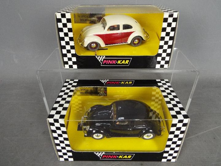 Pink-Kar - 2 x Volkswagen Beetle slot cars # CV014 1954 split window Beetle in black,