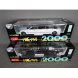 Sunstar - 2 x Lincoln Town Car stretched limousines in 1:18 scale from the 'New Millenium Edition'