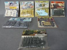 Frog, Airfix - Seven carded and bagged plastic model kits.